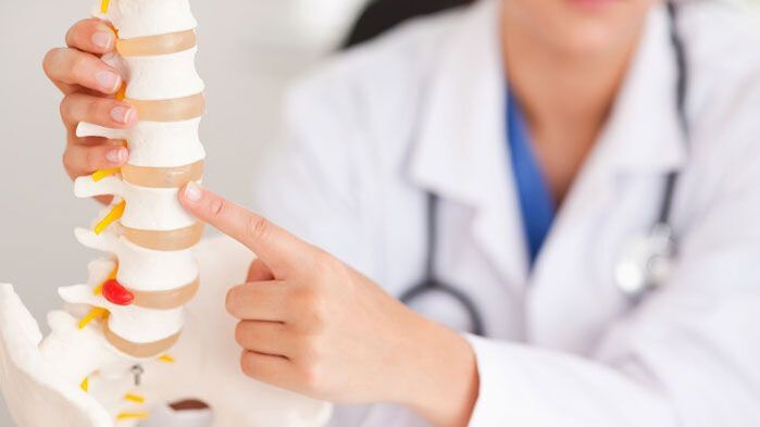 Explain the phenomenon of lumbar cartilage degeneration on a spinal model